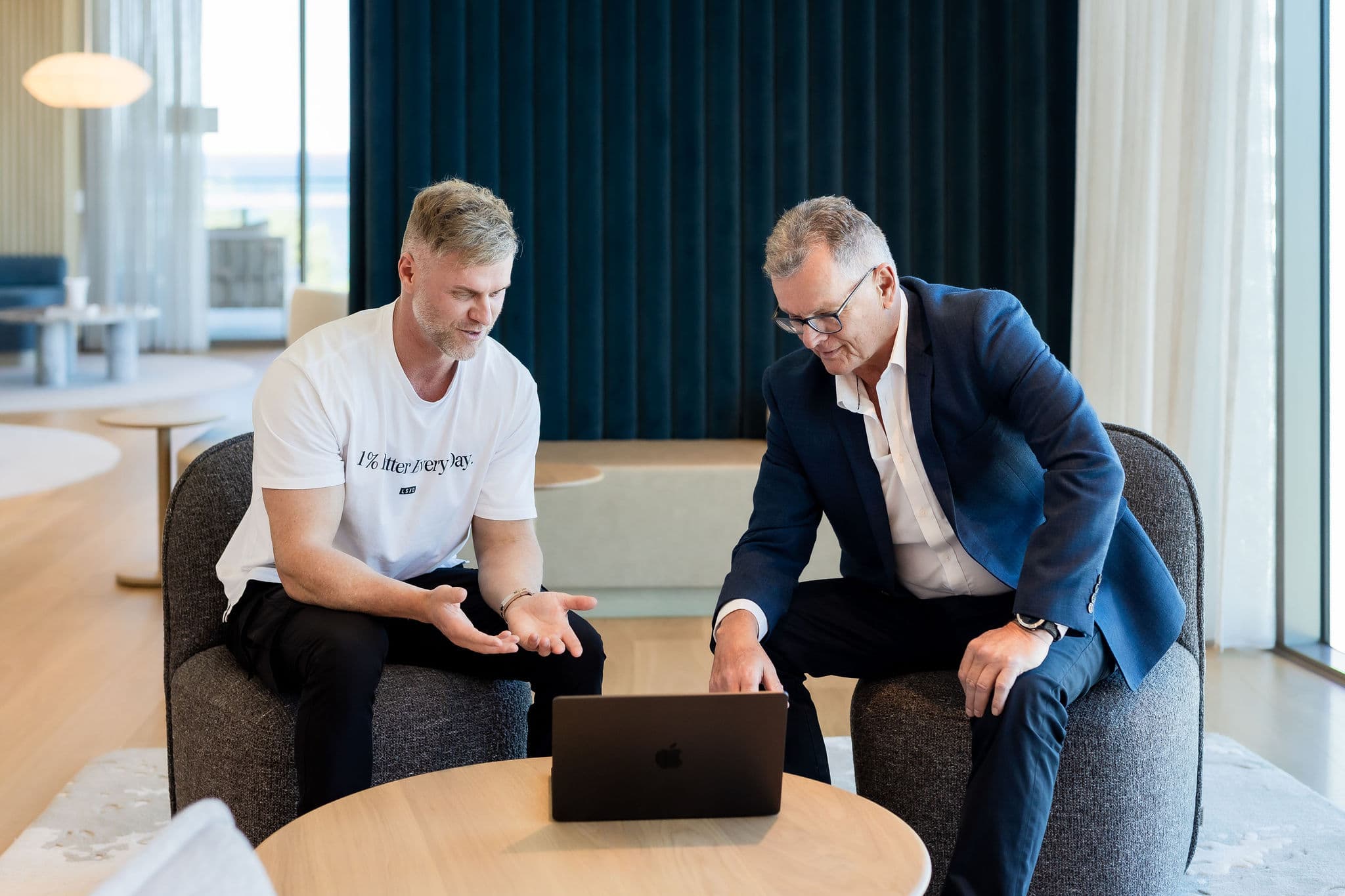 Maxfin brokers reviewing finance options with a client